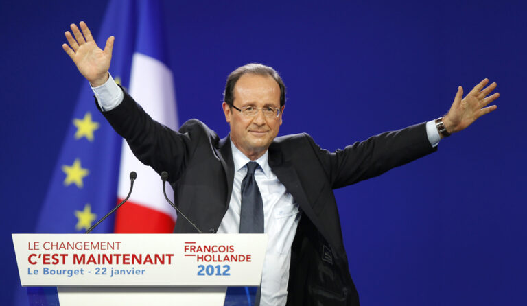 Francois Hollande, Socialist Party candidate for the 2012 French presidential election waves at the end of a political rally in Le Bourget near Paris