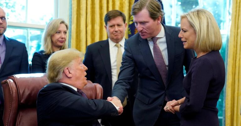 FILE PHOTO: U.S. President Trump shakes hands with Krebs at Cybersecurity and Infrastructure signing ceremony in Oval Office of White House in Washington