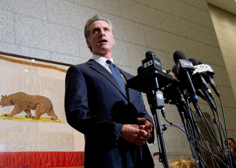 FILE PHOTO: California Governor Gavin Newsom attends a hearing on the use of National Guard troops amid federal immigration sweeps, in San Francisco